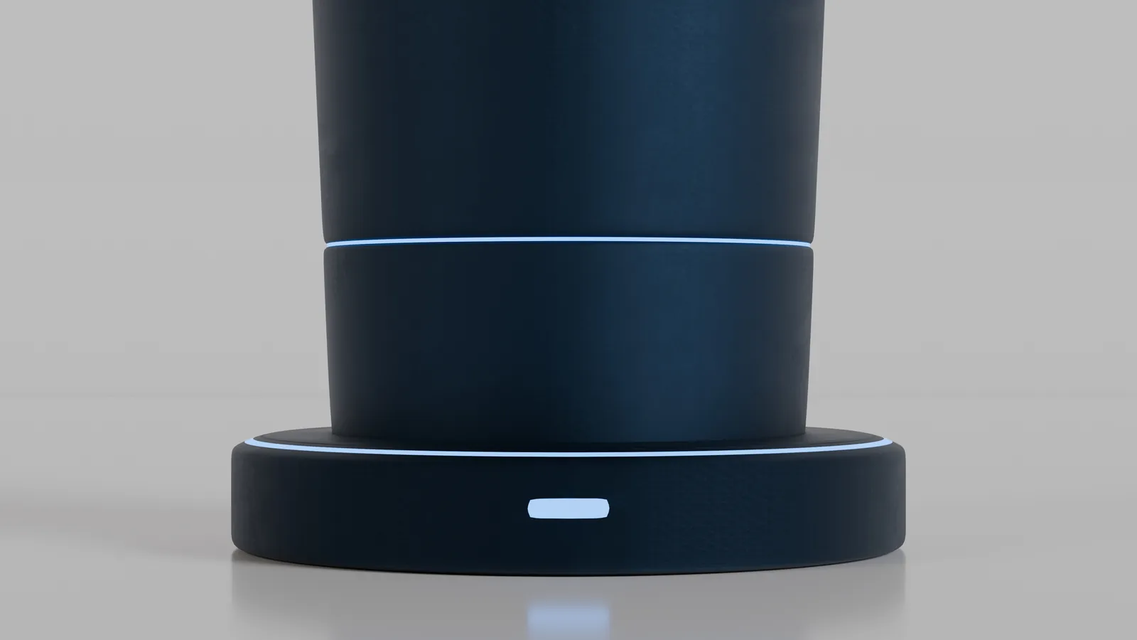 Close-up of the Qu tumbler's illuminated ring and charging base